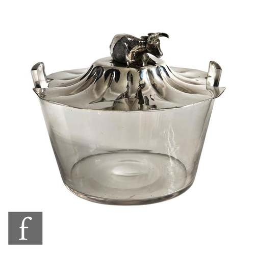 280 - A hallmarked silver and clear glass butter dish, the glass base supporting a silver plated circular ... 