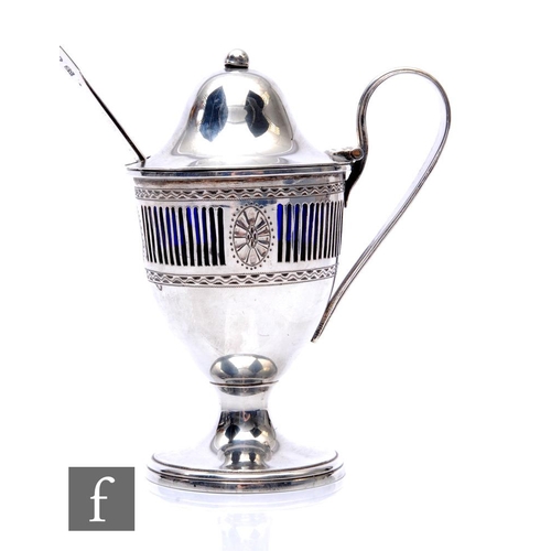 281 - A hallmarked silver pedestal mustard pot and cover with pierced sides and loop handle, Chester 1904,... 