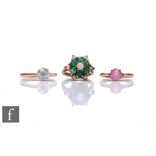 78 - Three assorted 9ct stone set rings to include an emerald and opal cluster and two paste single stone... 