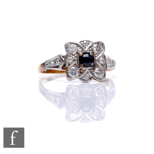 81 - An 18ct sapphire and diamond cluster ring, central sapphire to a border of nine diamonds to a square... 