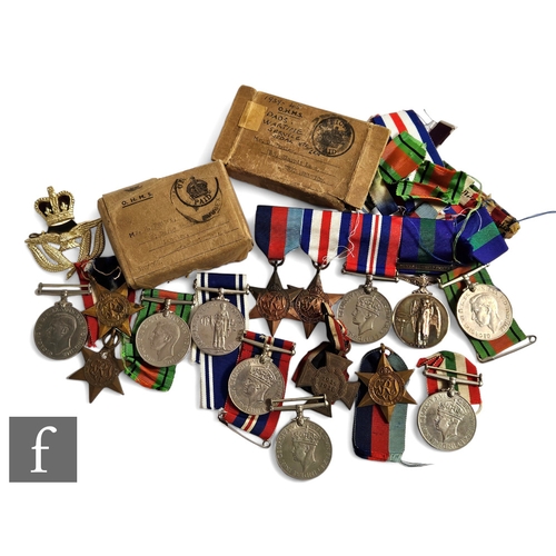 733 - A small parcel lot of assorted World War Two medals to include Stars, Defence and British War exampl... 