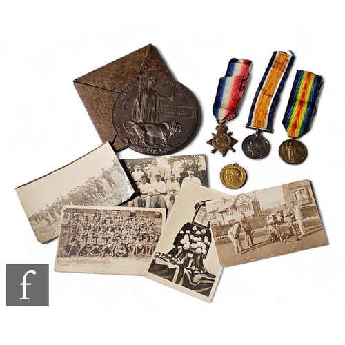 741 - A World War One trio of medals awarded to 1452. W M Hands.W Yorks Reg, with death plaque, also five ... 