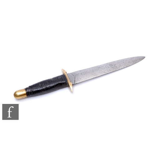 744 - An early 20th Century fighting knife, 14.5cm blade, whipped leather handle with brass finial and gua... 