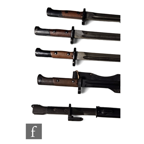 757 - Three German Mauser bayonets and scabbards, a similar Czech bayonet and scabbard with leather holste... 