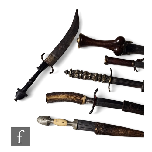 759 - An early 20th Century Bavarian hunting knife with leather scabbard and horn handle, a similar brass ... 