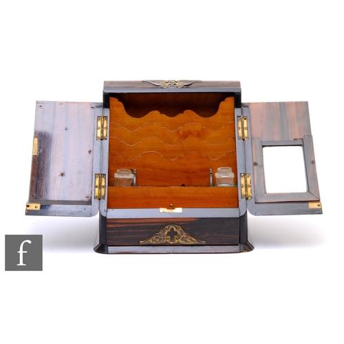 762 - A 19th Century coromandle stationery box, fitted with a stepped interior and two inkwells enclosed b... 