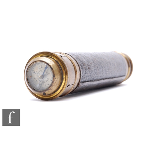 780 - A late 19th Century pocket three drawer brass telescope, the end cap with compass attachment, length... 