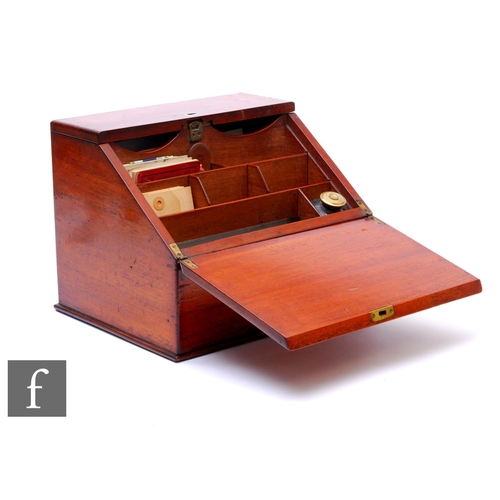 813 - A small Victorian mahogany stationery cabinet fitted with a single inkwell and divisioned interior e... 