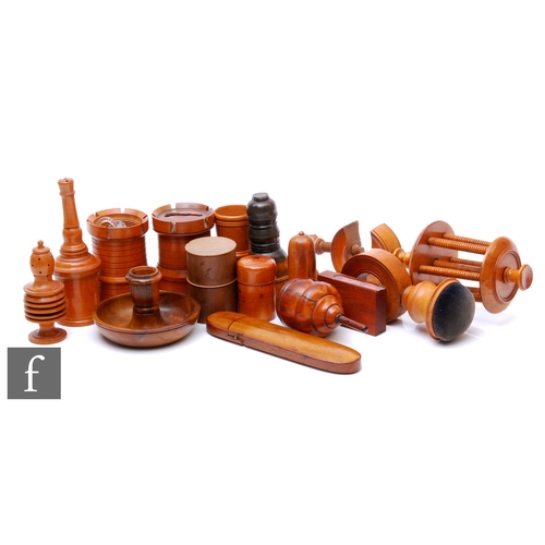 819 - A 19th Century collection of Mauchline ware, to include sewing clamps, shakers etc. (qty)