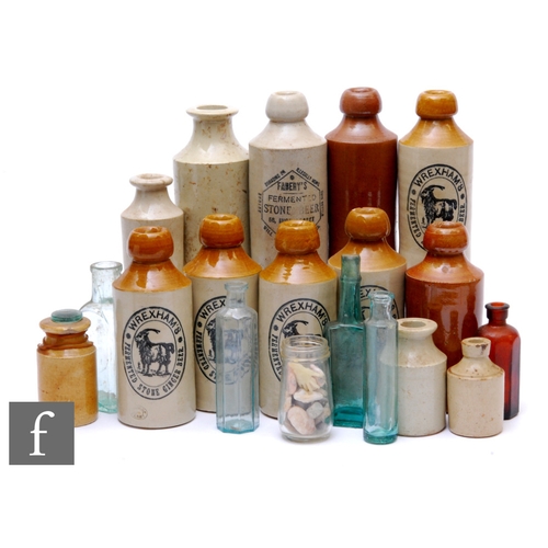 845 - A collection of transfer printed pictorial two tone ginger beer bottles for Wrexham with highland go... 