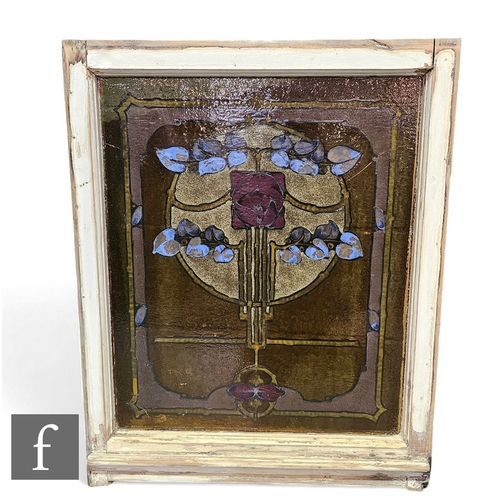 850 - An Edwardian Art Nouveau stained glass window, trailing blue leaves centred by a red rose within a c... 