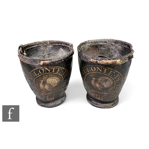 851 - A pair of early 19th Century French stitched leather fire buckets, each painted with a turkey within... 