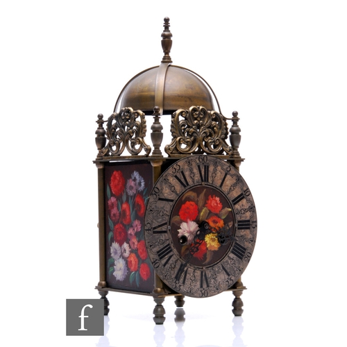 870 - A 17th Century style brass lantern clock, silvered chapter ring with painted floral centre, the move... 