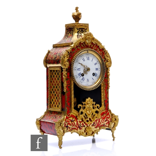 875 - A late 19th Century French eight day, bell strike boulle and ormalu work mantle clock, the Roman and... 