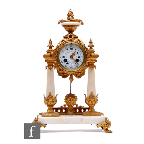 878 - A late 19th Century French white marble and gilt mounted mantle clock, circular dial below a surmoun... 