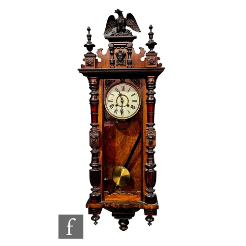 879 - A late 19th Century Vienna regulator wall clock, the eight day spring driven movement enclosed by a ... 