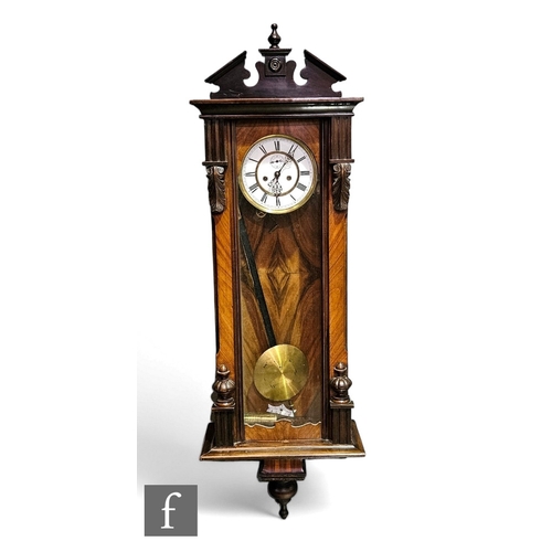 883 - A late 19th Century Austrian walnut cased regulator wall clock, the single weight movement enclosed ... 