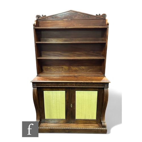 1036 - A George IV mahogany chiffonier, the three tier rack below an architectural cornice and fixed reeded... 