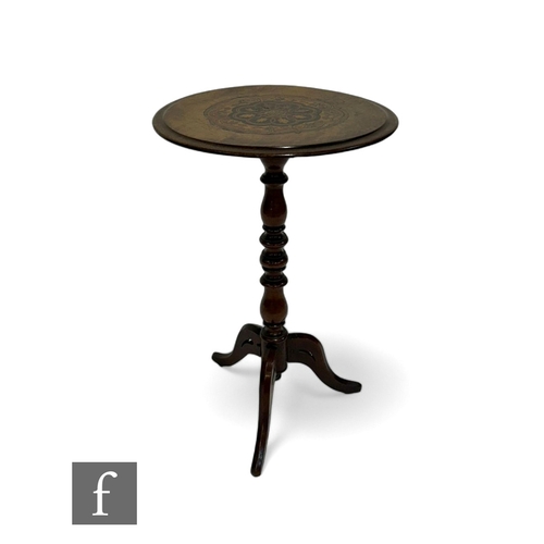 1039 - A Victorian marquetry inlaid circular figured walnut tripod occasional table on splayed legs, diamet... 