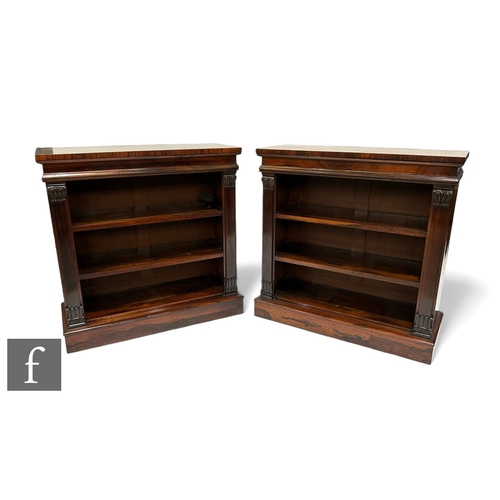 1043 - A pair of small William IV rosewood open bookcases, fixed shelfs below a moulded edge top flanked by... 