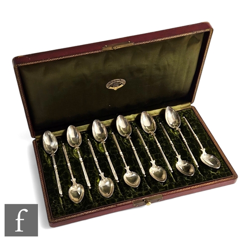 272 - A cased set of 19th Century French silver coffee spoons, bright cut decoration to bowls in a plush l... 