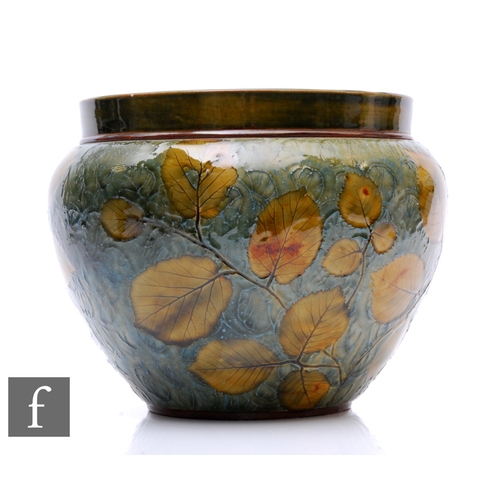 238 - An early 20th Century Royal Doulton stoneware jardinière from the Natural Foliage range, impressed w... 