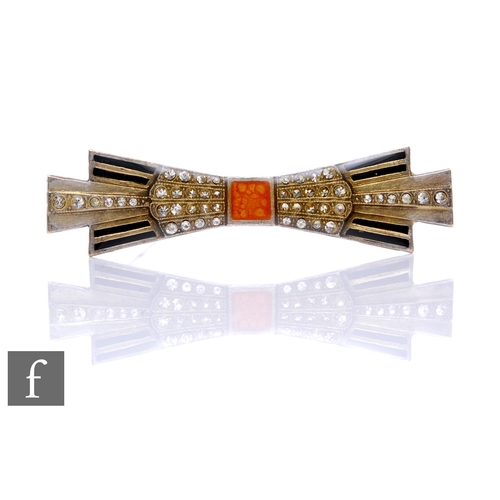 81 - An Art Deco brooch in the form of a bow, inset with enamel and paste stones.