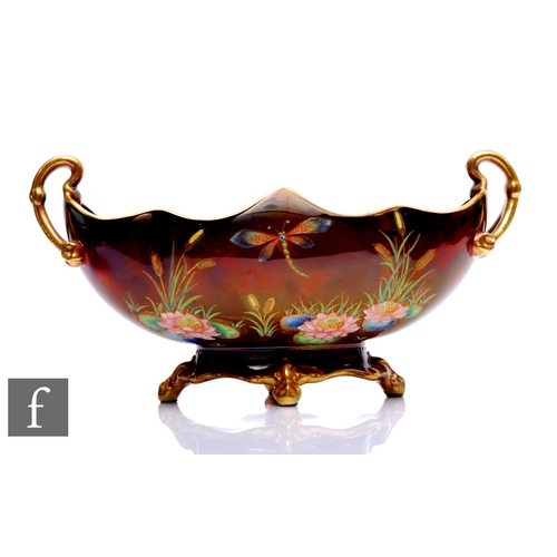 104 - A 1930s Carlton Ware Gondola bowl with arched handles decorated in the Dragon Fly pattern, with inse... 