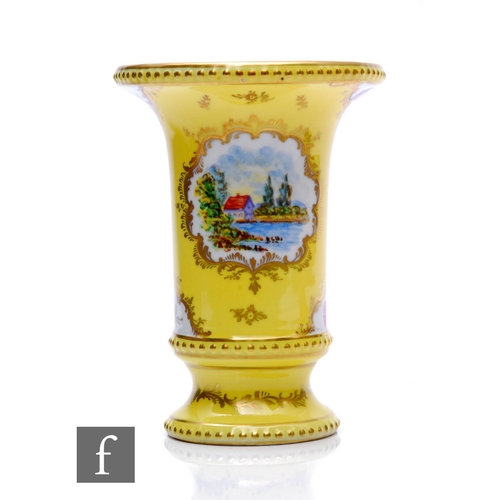 105 - A mid 20th Century Dresden vase of footed sleeve form, hand painted with a landscape cartouche panel... 