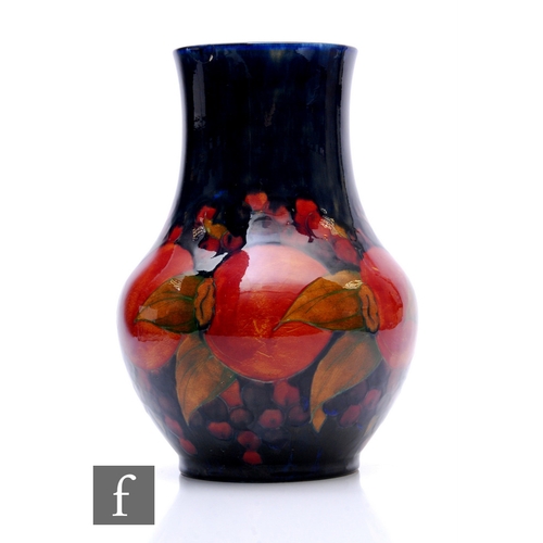 125 - An early 20th Century William Moorcroft Pottery vase of shouldered ovoid form with drawn collar neck... 