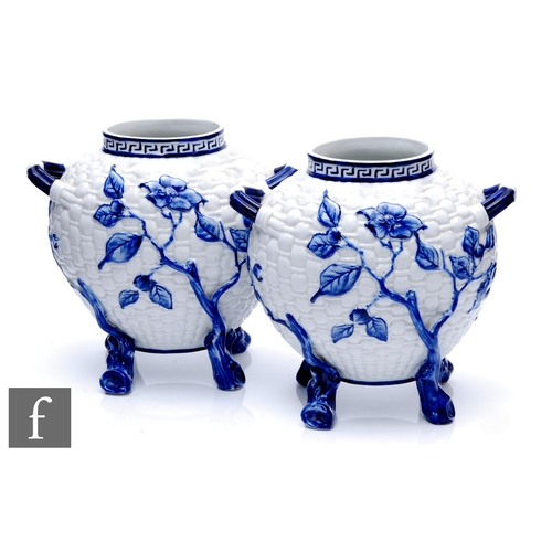 126 - A pair of late 19th Century Worcester vases in the Aesthetic taste, each of compressed ovoid form wi... 