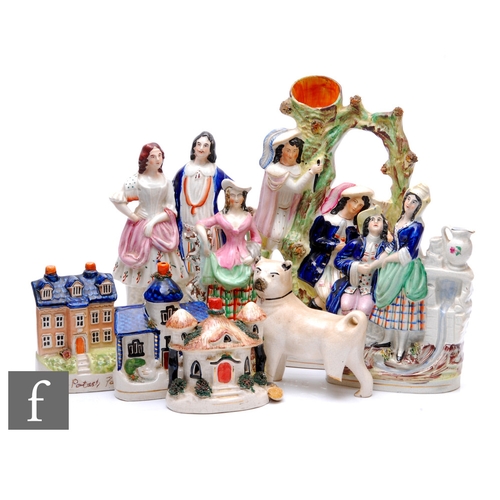 161 - An assorted collection of 19th Century Staffordshire flat back figures to include an arbor group tit... 