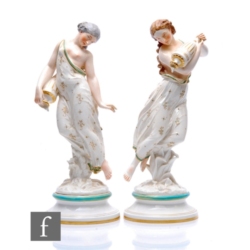 A pair of Royal Worcester companion figures titled Evening Dew and Morning Dew circa 1870, each modelled as a classical maiden floating above reeds and ferns, scattering dew from their gilt detailed amphora shaped urns, their diaphanous robes trimmed with blue and pink detailing, each mounted upon a glazed inverted socle and pedestal base, impressed mark, shape numbers 2/36 and 2/35, height 40cm, restored.