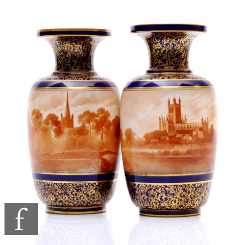 192 - A pair of early 20th Century Doulton Burslem vases, each of footed cylindrical shouldered form with ... 