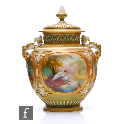 201 - An early 20th Century Royal Worcester Hadley shape pomander and cover, the footed ovoid body with re... 