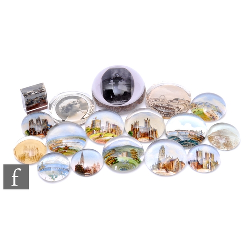 637 - A collection of 20th Century assorted paperweights, to include thirteen souvenir weights, to include... 