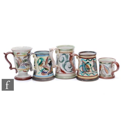 157 - A collection of Glyn Colledge for Denby tankards, each decorated with stylised flower heads and foli... 