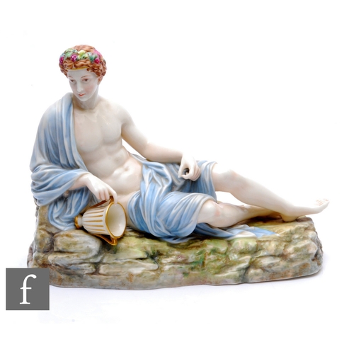 185 - A later 19th Century Royal Worcester figure of Bacchus circa 1870, modelled as a reclining male figu... 