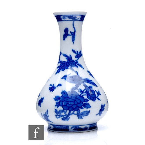 282 - A late 19th to early 20th Century French Limoges bottle vase in the Chinese taste by Bernardaud &... 