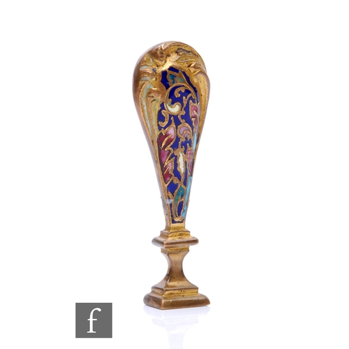 140 - A late 19th Century brass desk seal, the acanthus handle with blue and red champ leve enamelling, he... 