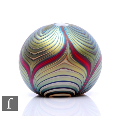 641 - A contemporary Richard P. Golding glass paperweight, of domed form, decorated to the surface with a ... 