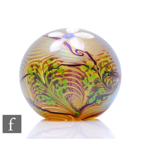 642 - A contemporary Richard P. Golding glass paperweight, of domed form, decorated to the surface with th... 