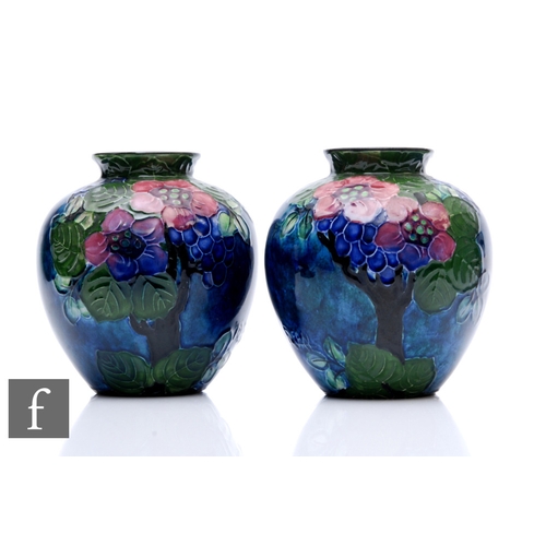 89 - A pair of 1920s pottery vases designed by Roger Dean for Thomas Forester & Sons, each of ovoid f... 