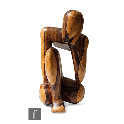 198 - A 20th Century carved and polished hardwood  study of a resting thinking man, height 45cm.