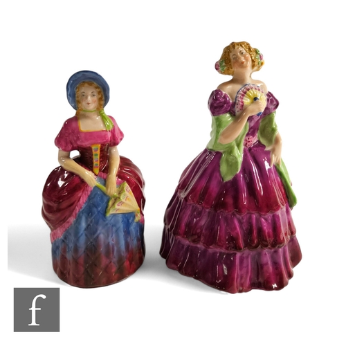 316 - A 1930s Arcadian China figure titled Victorian Belle, modeled as a lady in crinoline dress picked ou... 