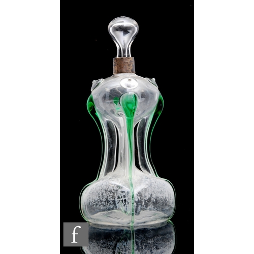 349 - A late 19th Century Stevens & Williams Scrooge decanter in clear crystal with applied green trai... 