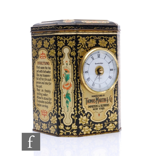 375 - A vintage tea caddy with lithograph printed design by Thomas Martin & Co, mounted with a clock a... 