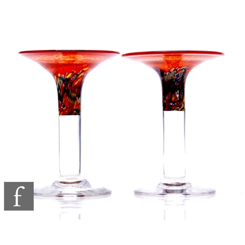 378 - A pair of 20th Century Bertil Vallien for Kosta Boda Satellite series candlesticks, of flared form w... 