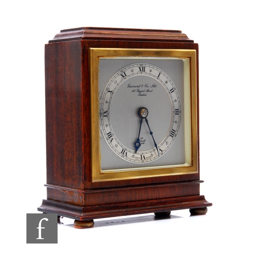 391 - A mid 20th Century mahogany eight day Elliott  mantel clock, Roman numerals to a silver chapter ring... 