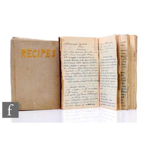 395 - Two 1920s recipe books, each with newspaper and hand annotated recipes to include marmalade, Christm... 